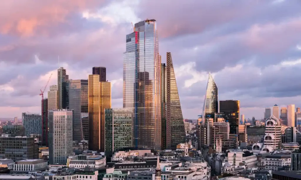 Aerial view of the City of London skyline at dusk